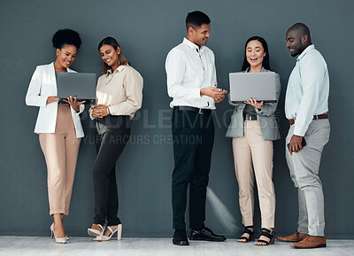 Buy stock photo Business people, group and laptop with coach for learning, proposal and teamwork by wall background together. Young executive team, diversity and mentor with men, women and computer for web design