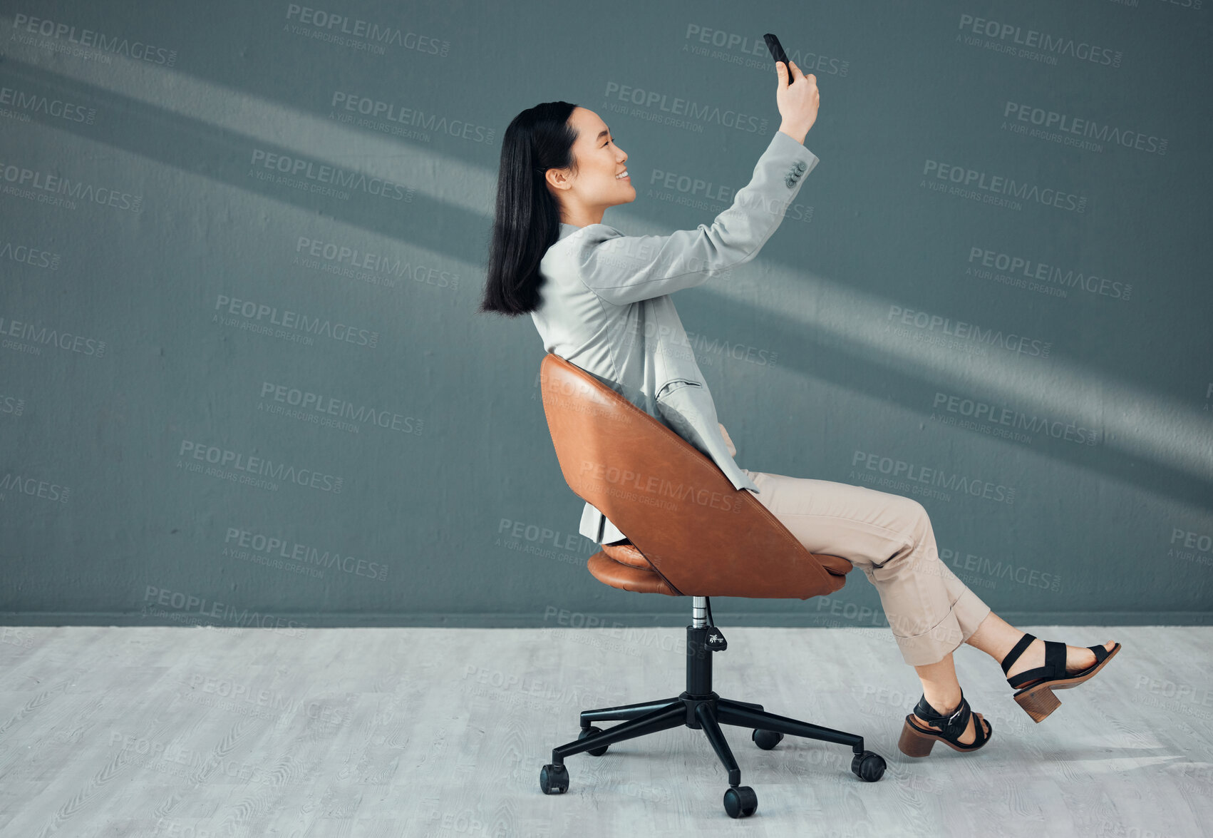 Buy stock photo Selfie, video call and woman with a phone for connection, signal and communication at work. Conversation, corporate and Asian employee reading an email, message or chat on a mobile app in an office