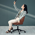 Selfie, video call and woman with a phone for connection, internet and communication at work. Conversation, corporate and Asian employee reading an email, message or chat on a mobile app in an office
