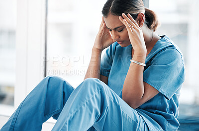 Buy stock photo Burnout, stress and medical with nurse on floor of hospital for sad, mental health and headache. Anxiety, depression and frustrated with tired woman in clinic for healthcare, medicine and nursing