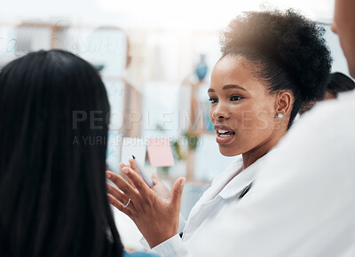 Buy stock photo Business, black woman and leader speaking, planning and discussion for growth, project portfolio and ideas. African American female manager, employee and staff in workplace, strategy and teamwork