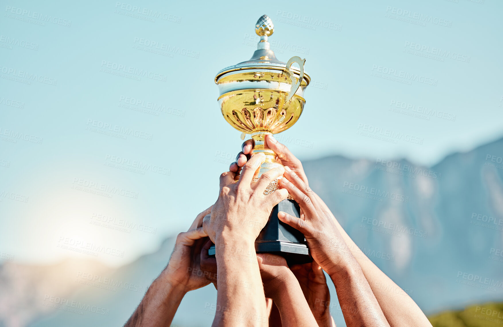 Buy stock photo Sports, champion and hands of team with trophy for achievement, goal and success together. Celebration, winner and people holding an awards cup after winning a sport competition or rugby tournament