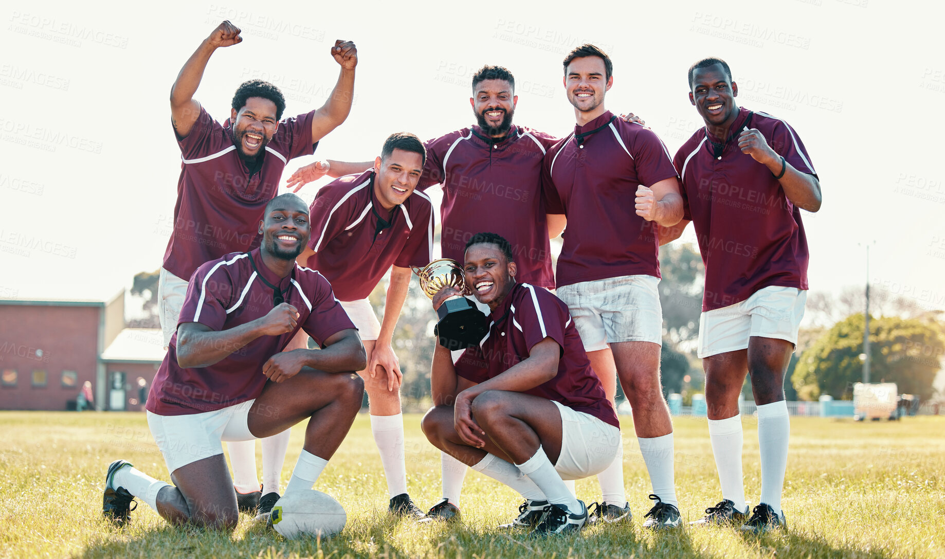 Buy stock photo Sports, winner and rugby team with trophy in celebration for winning match, game and competition. Fitness, success and portrait of sport players celebrate victory, goals and achievement on field