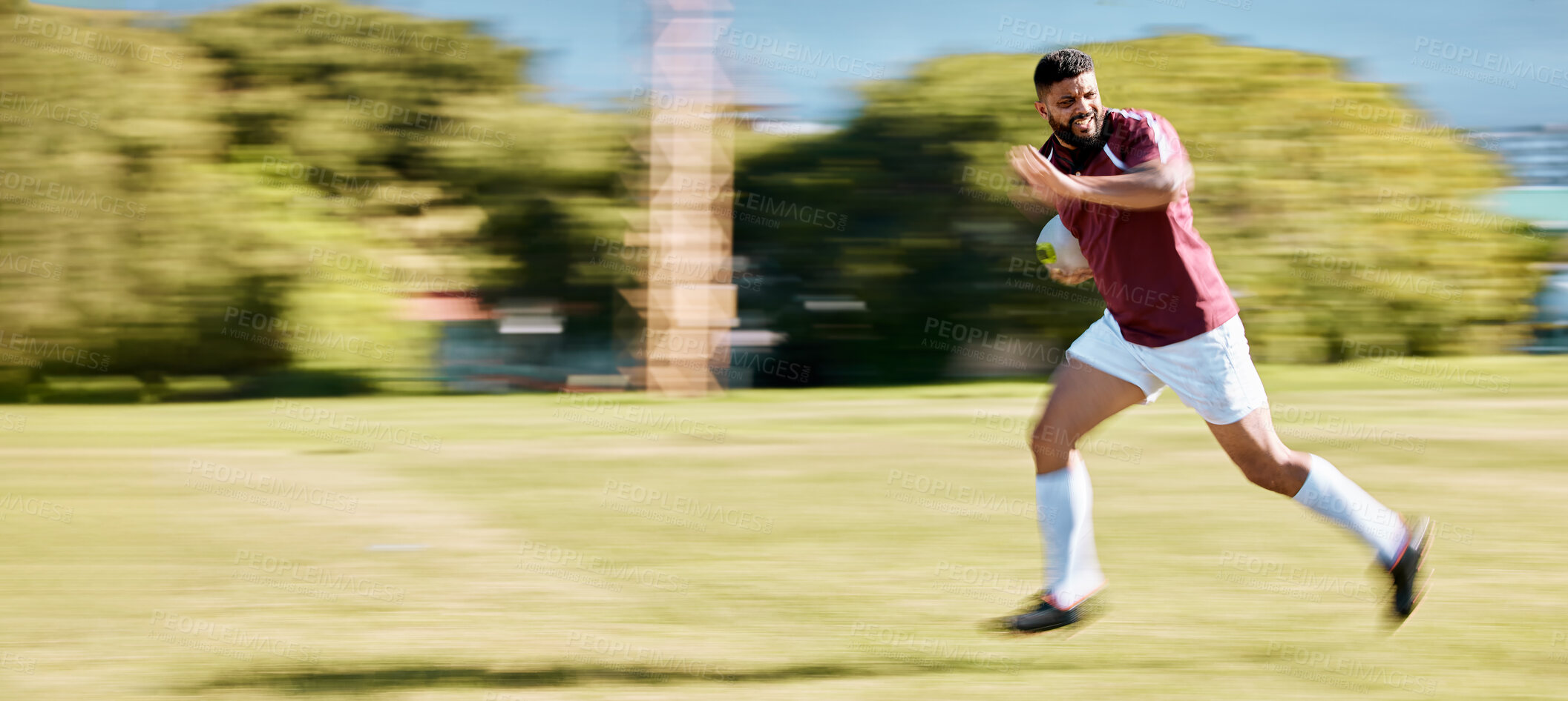 Buy stock photo Rugby, running and speed of an athlete with energy and sports ball on a grass field. Workout, game exercise and fast runner moving with action and intense cardio for sport and match training outdoor