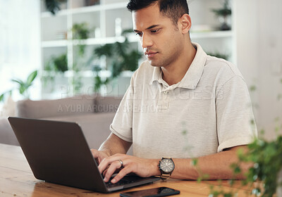 Buy stock photo Serious, planning and young man on laptop typing email, financial management or startup investment research. Professional worker, employee or person working on computer for finance career opportunity