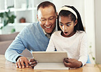 Digital tablet, shock and girl with her father streaming a movie or video online for entertainment. Surprise, technology and child watching a film or show with her dad on mobile device at their home.