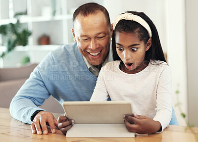 Buy stock photo Digital tablet, shock and girl with her father streaming a movie or video online for entertainment. Surprise, technology and child watching a film or show with her dad on mobile device at their home.