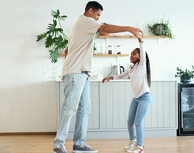 Buy stock photo Dance, playful and father and daughter bonding, teaching a move and enjoying quality time. Love, help and dad dancing with a girl daughter, playing and being crazy with happiness in the kitchen