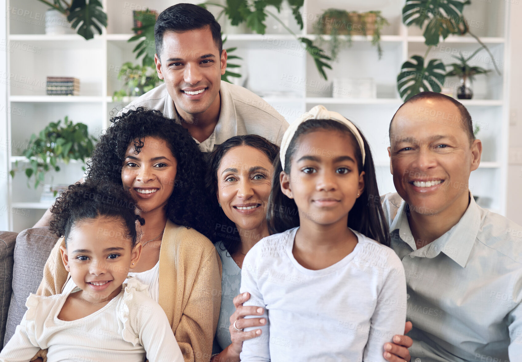 Buy stock photo Portrait of family with kids, parents and grandparents on sofa with smile in happy home in Brazil. Happiness, generations of men and women with children, spending time together making fun memories.