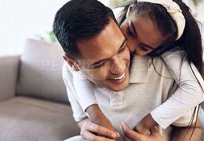 Buy stock photo Family, hug and girl with father on sofa, happy and laugh, kiss and bonding in their home. Embrace, smile and parent with child on couch, play or enjoy day off, weekend or piggyback in a living room
