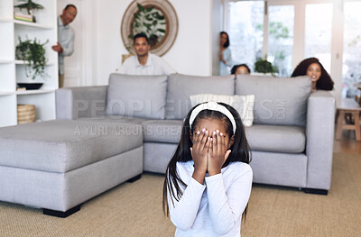 Buy stock photo Hiding, counting and family playing a game in the living room for bonding, quality time and fun. Together, playful and child covering her eyes for hide and go seek with parents and siblings in lounge