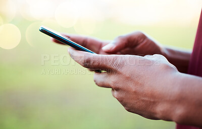 Buy stock photo Hands, phone and communication on mockup for social media, texting or chatting in the outdoors. Hand of person typing on smartphone with 5G connection, browsing or mobile app on blurred background