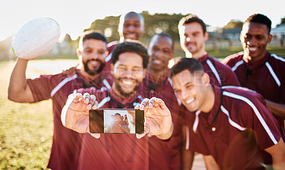 Buy stock photo Portrait, phone and selfie of rugby team on field after exercise, workout or training. Teamwork, sports and group of friends, men or players take pictures for happy memory or social media with mobile