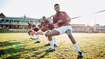 Buy stock photo Sports, teamwork and tug of war, men at fitness training and practice for competition or game on field. Workout, collaboration and team pulling rope, working together in match for power and strength