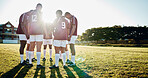 Man, team and holding hands in sports motivation for fitness, collaboration or coordination on grass field. Group of men huddle touching hand in circle for teamwork, community or sport strategy