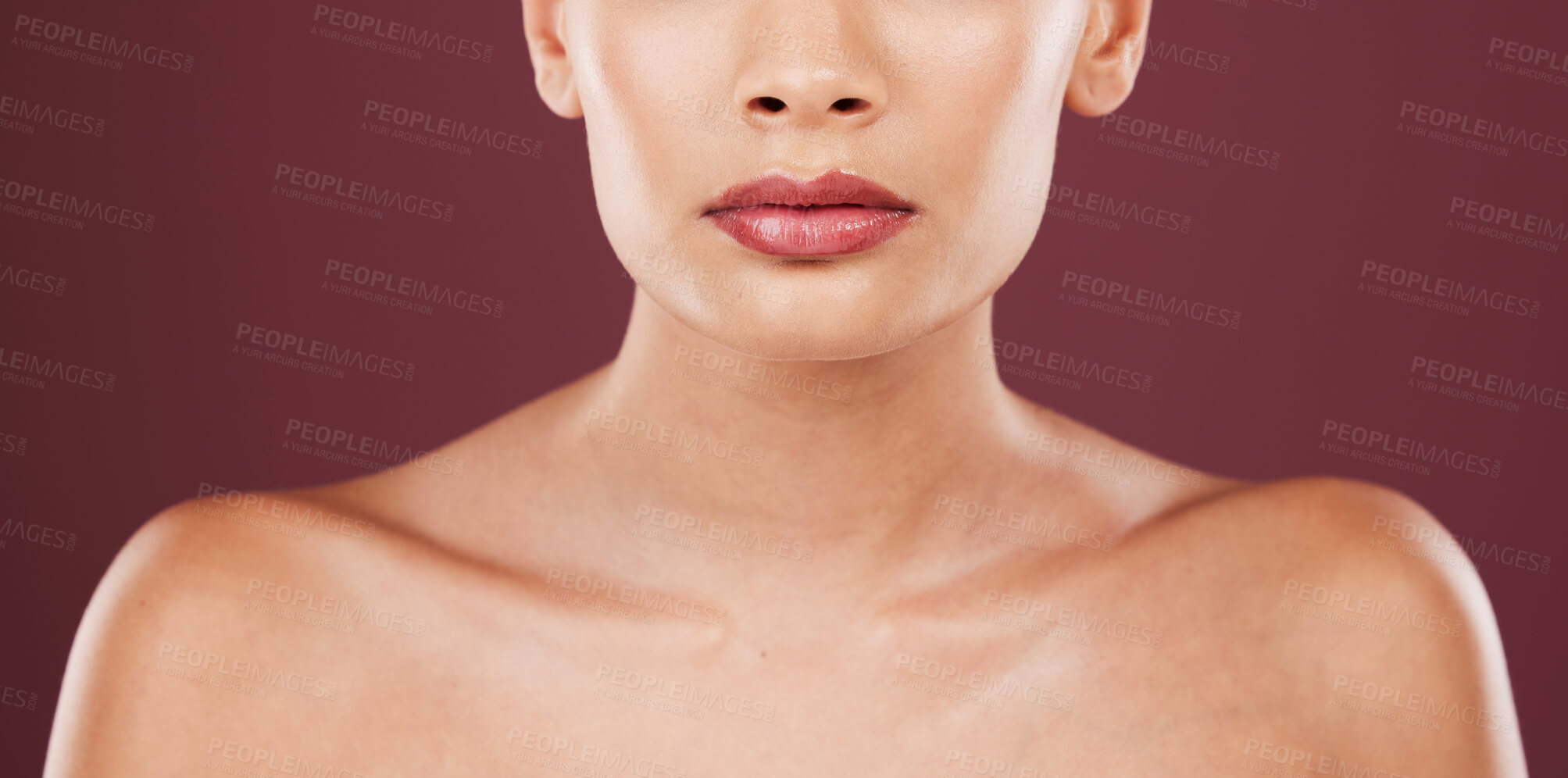 Buy stock photo Face lips, makeup and beauty of woman in studio isolated on a red background. Skincare dermatology, lipstick cosmetics and female model with beautiful, glowing or healthy skin after mouth treatment.