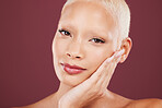 Makeup, portrait and black woman in studio, soft and beauty cosmetics, natural and maroon or red background. Skincare, face and girl model relax in luxury pamper treatment while isolated on mockup.