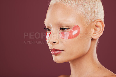 Buy stock photo Eye patch, relax and spa beauty of black woman doing face cleaning and wellness facial. Calm, skin glow and mockup of a young model in a studio for dermatology, collagen and self care treatment