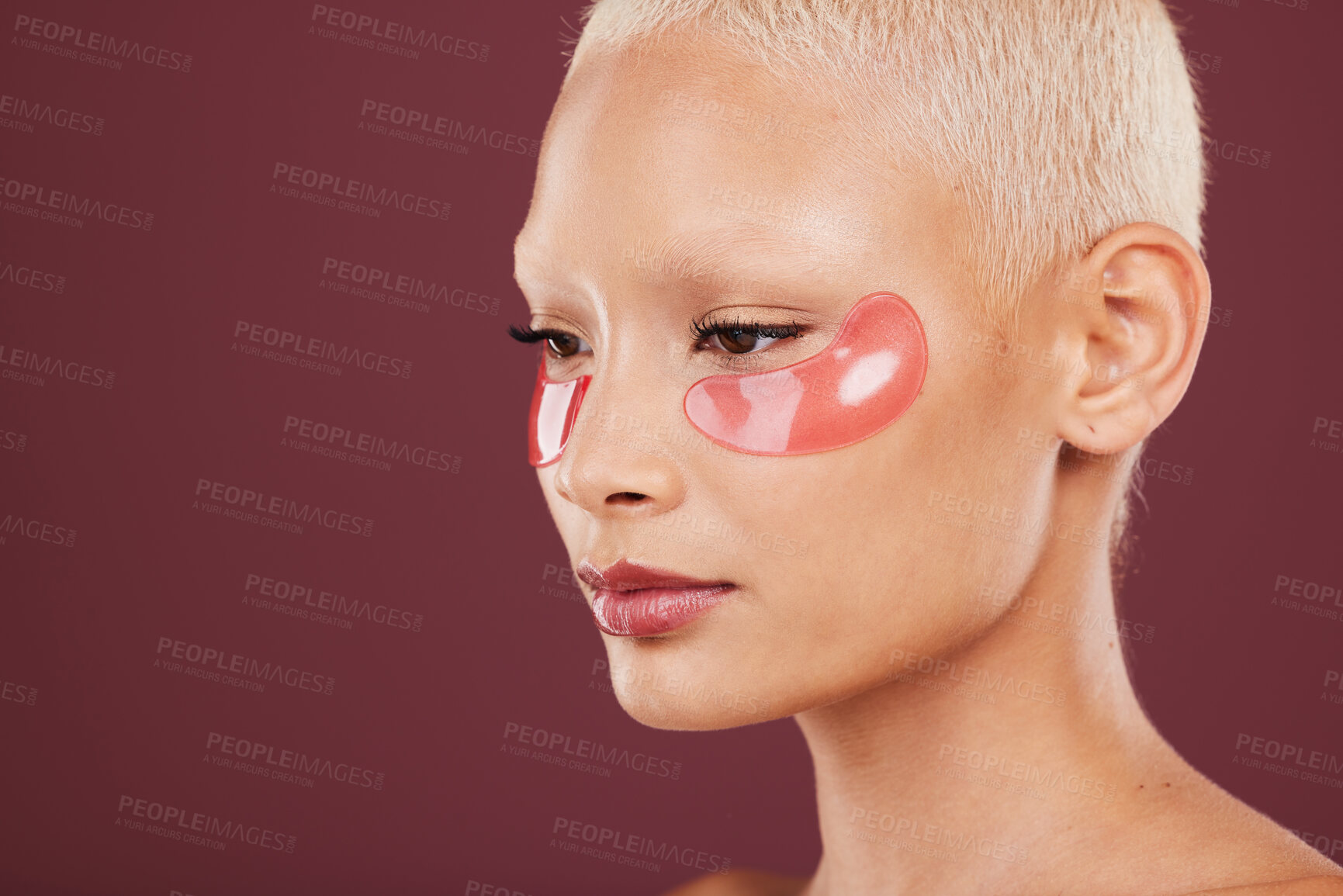 Buy stock photo Eye patch, relax and spa beauty of black woman doing face cleaning and wellness facial. Calm, skin glow and mockup of a young model in a studio for dermatology, collagen and self care treatment