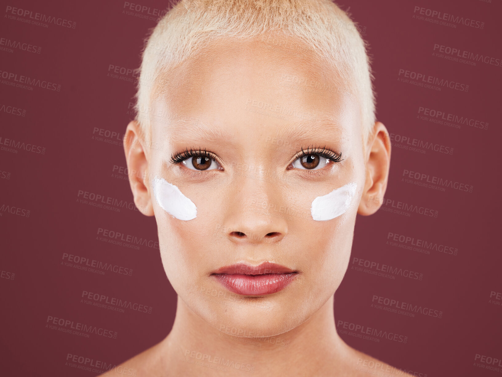 Buy stock photo Skincare, beauty and portrait of woman with lotion on face, cosmetics and skin product on studio background. Dermatology, facial treatment and model isolated with mock up, anti ageing care and glow