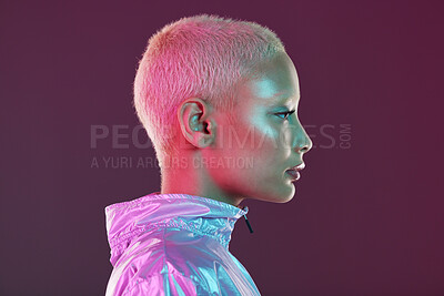 Buy stock photo Holographic fashion, woman face and glow for hologram trend isolated on a studio background. Futuristic, vaporwave and art color jacket on cyberpunk model for retro cosmetics and makeup shine on skin