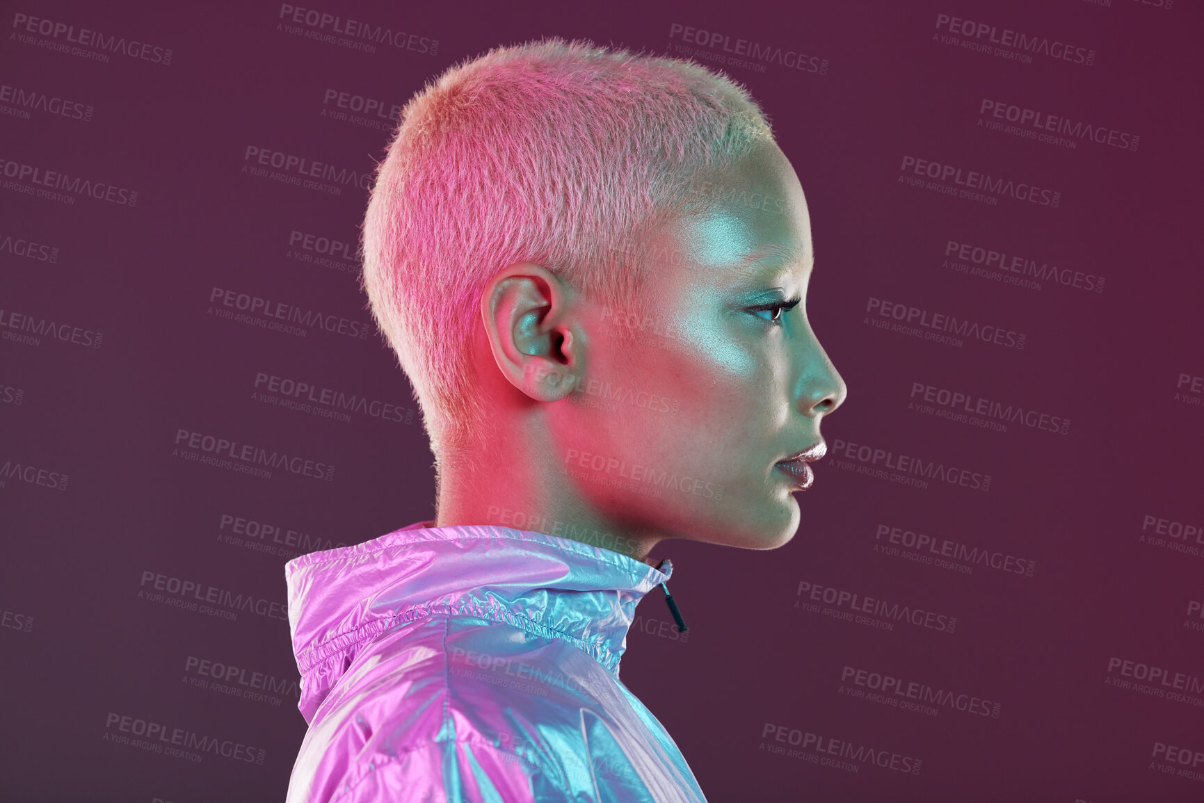 Buy stock photo Holographic fashion, woman face and glow for hologram trend isolated on a studio background. Futuristic, vaporwave and art color jacket on cyberpunk model for retro cosmetics and makeup shine on skin