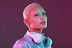 Cyberpunk fashion, black woman and headphones in studio, holographic clothes and vaporwave style. Futuristic model, young gen z and listening to music with retro aesthetic, audio technology and neon