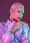 Cyberpunk, model and portrait of high fashion woman with unique style, makeup and hairstyle isolated in a studio neon background. Creative, artistic and colorful female is trendy and stylish