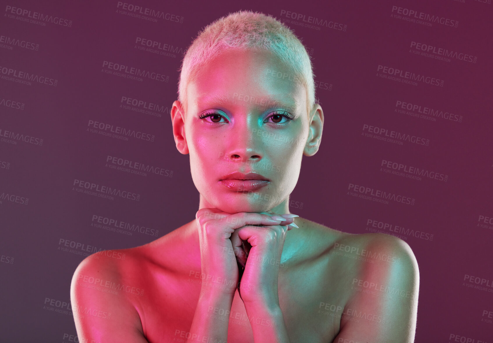 Buy stock photo Skincare, beauty and portrait of woman with neon makeup and lights in creative advertising on studio background. Cyberpunk, product placement and model isolated for futuristic skin care mockup space.