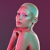Futuristic fashion, cyberpunk portrait and black woman with chrome clothing  in studio. Vaporwave, isolated and gen z with a young female model glow  with cosmetics and scifi clothes with mockup