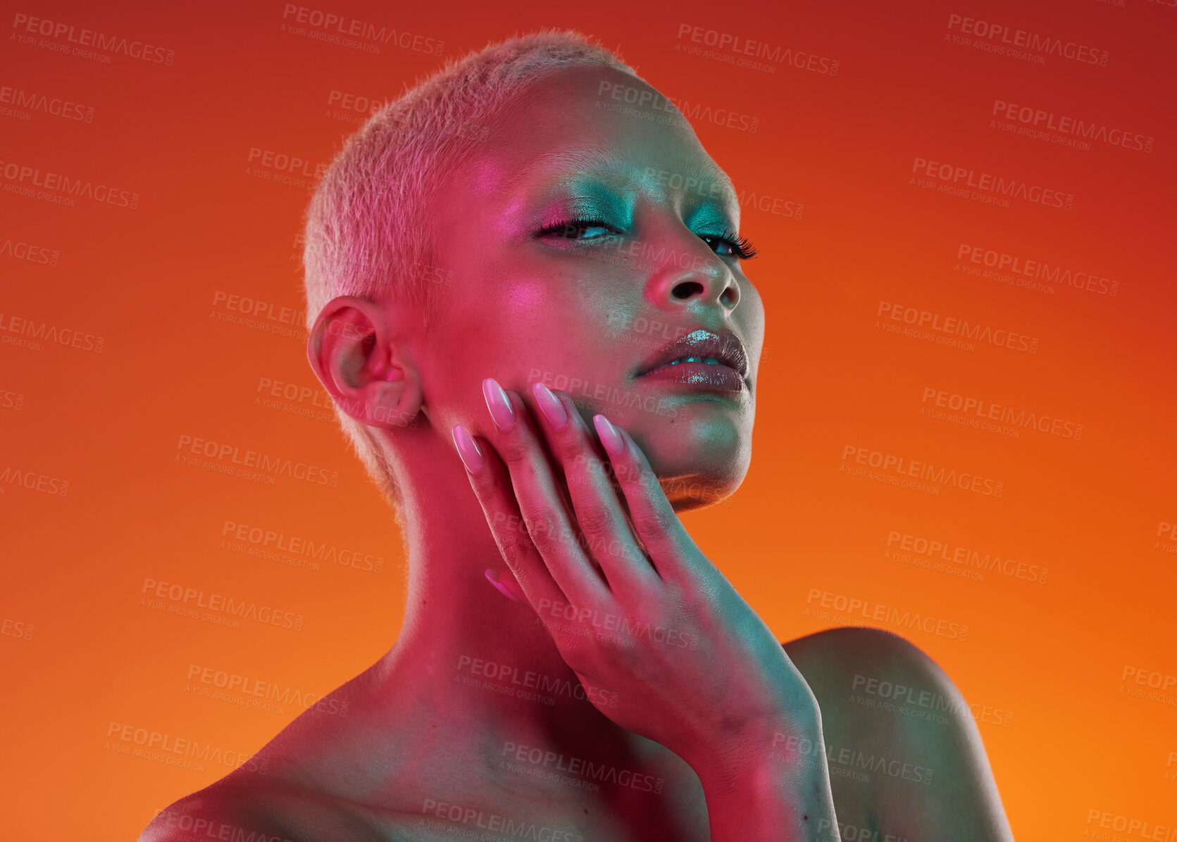 Buy stock photo Skincare, beauty and portrait woman with neon face makeup and light in creative advertising on orange background. Cyberpunk, art and model isolated for skin care and futuristic mockup space in studio