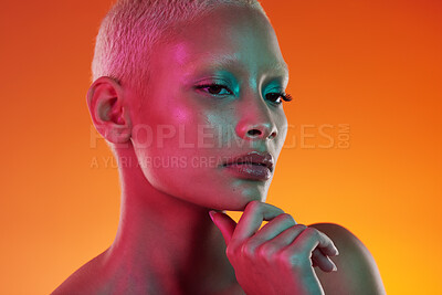 Buy stock photo Neon, beauty and portrait of woman thinking in face makeup and light in creative advertising on orange background. Cyberpunk, art and model isolated in skincare and futuristic mockup space in studio.