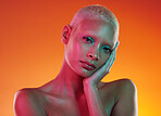 Art, neon beauty and portrait of woman with makeup and light in creative advertising on orange background. Cyberpunk, product placement and model isolated for skincare and futuristic mockup in studio