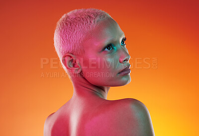 Buy stock photo Art, neon beauty and woman with face makeup and lights in creative advertising on orange background. Cyberpunk, product placement and model isolated for skincare and futuristic mockup space in studio
