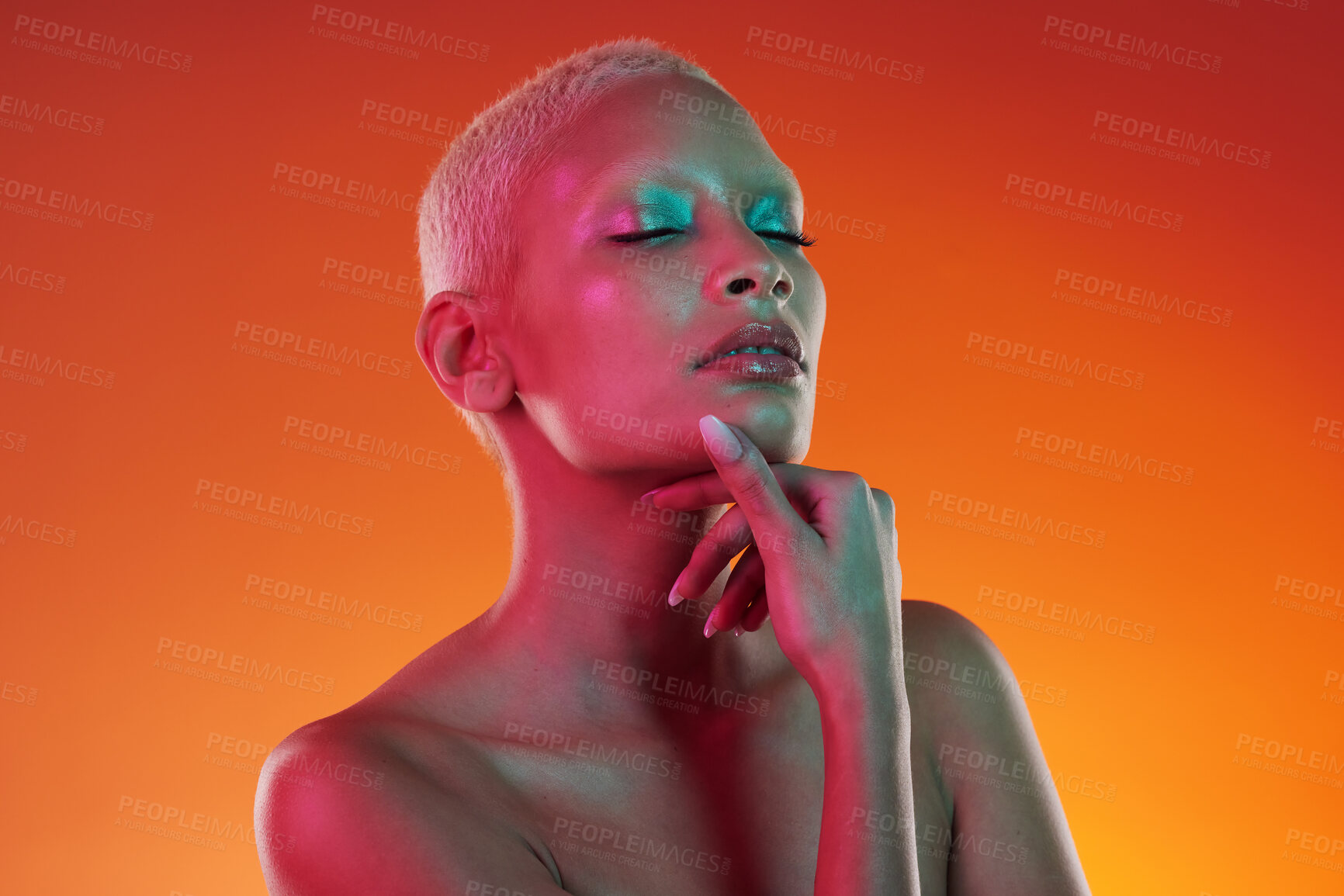 Buy stock photo Skincare, beauty and eyes closed, woman with neon makeup and light for creative advertising on orange background. Cyberpunk, art and model isolated for skin care and futuristic mockup space in studio