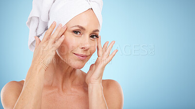 Buy stock photo Skincare, portrait and senior woman isolated on a blue background for beauty, cosmetics and anti aging mockup. Mature model or person makeup foundation, dermatology and hygiene wellness in studio