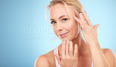 Buy stock photo Woman, face and portrait of beauty for skincare, spa mockup and blue background of wellness cosmetics. Studio model, facial and healthy aesthetic of laser dermatology, natural shine and salon results