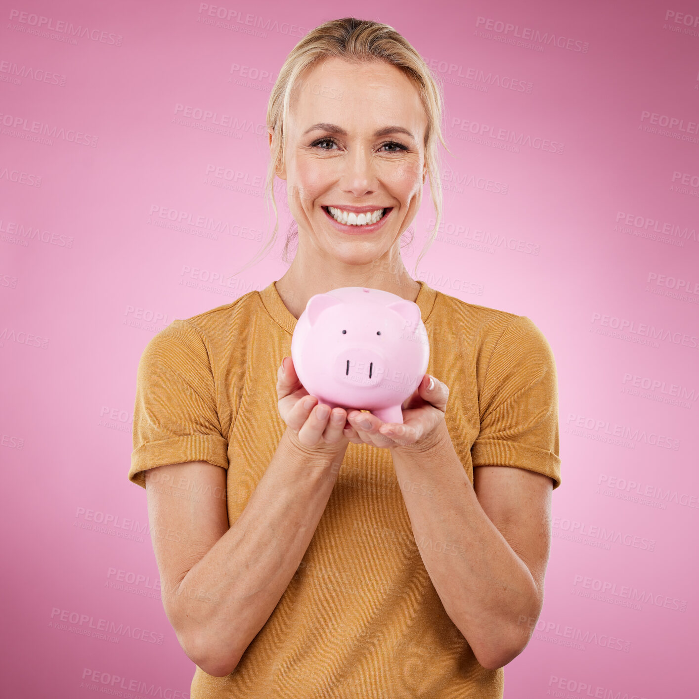 Buy stock photo Woman, piggybank and portrait smile for savings, investment or cash money against a pink studio background. Happy female holding financial loan, profit or finance increase and salary on mockup