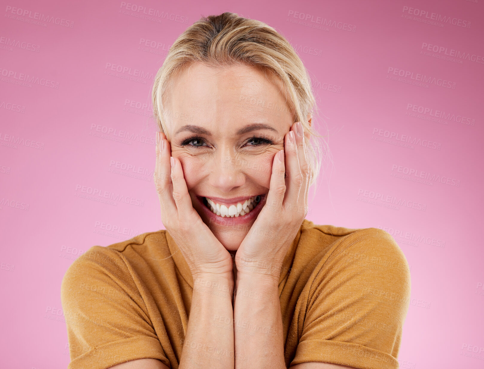 Buy stock photo Happy portrait, woman and smile on pink background, studio and backdrop of happiness. Excited mature model, face and confident lady with motivation, surprise hands or beauty for self love of skincare