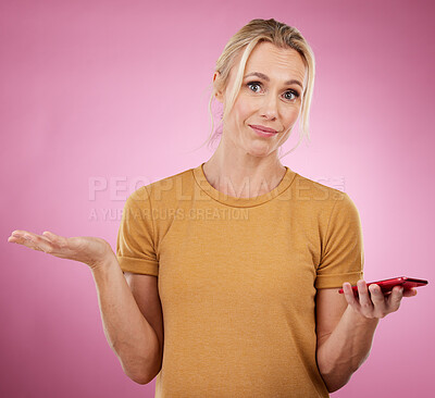 Buy stock photo Portrait, senior woman and  confused with smartphone, questioning and against studio background. Face, mature female and lady with cellphone, frown or doubt with body language, notification or alert 