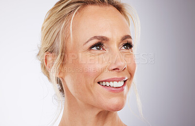 Buy stock photo Beauty, face and skincare of woman in studio for cosmetic and anti aging dermatology. Happy mature aesthetic model thinking on grey background for self love, care and wellness facial glow mockup idea