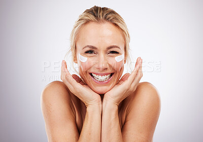 Buy stock photo Face cream, skincare and portrait of mature woman in studio for wellness, beauty and care on grey background. Facial, product or sunscreen by lady relax in luxury, cosmetic and lotion while isolated