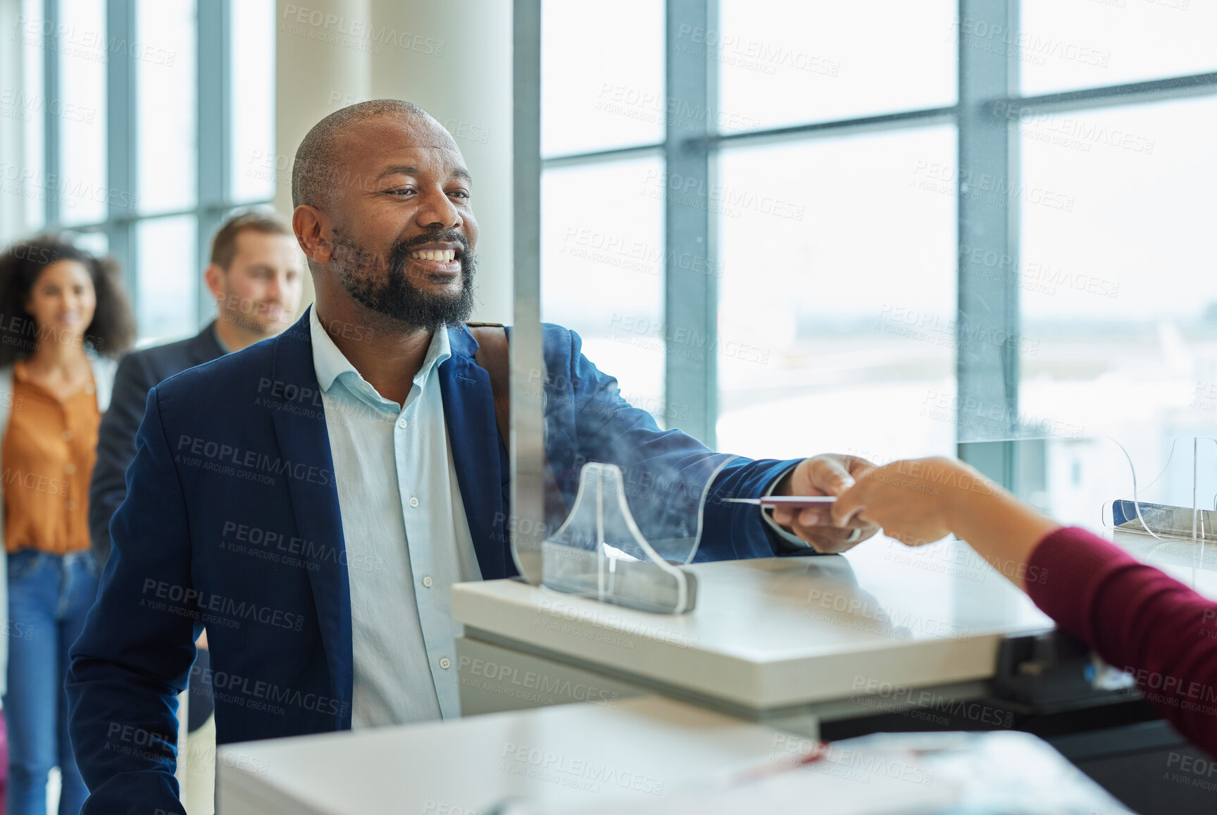 Buy stock photo Ticket check, counter and black man in airport line for passport or travel service. Happy customer person at security or consultant booth or glass window for business booking or buy paper at seller