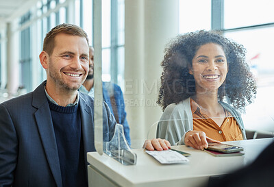 Buy stock photo Travel, airport and boarding with business people at a check in counter for an international flight. Documents, passport or ticket with a man and woman traveling for the global growth of a company