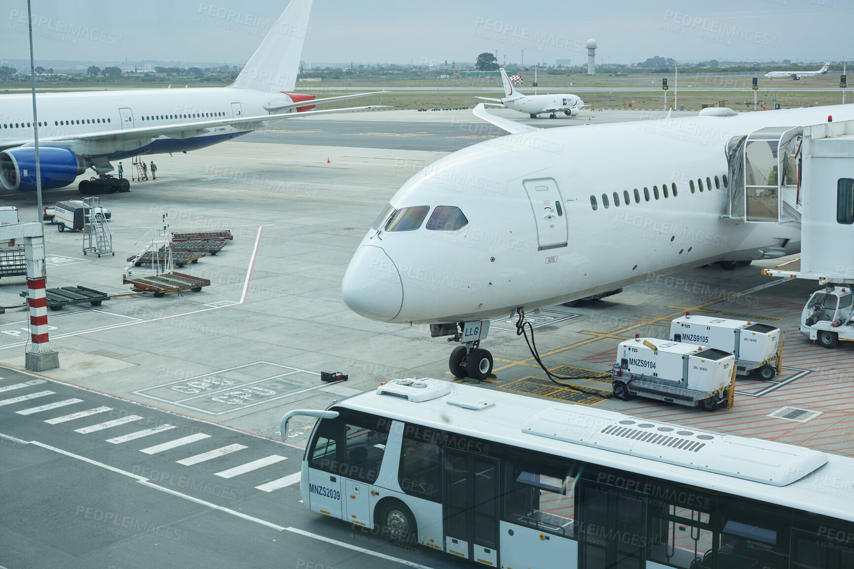 Buy stock photo Airplane, bus and loading luggage outdoors for travel with heat pump for air conditioning for ac ventilation on journey. Global, transportation or commercial aeroplane on ground with cargo for flight