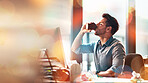 Computer, office and man drinking a coffee for working on report, writing email and online research report. Business mockup, productivity and happy male with beverage, caffeine or latte in workplace