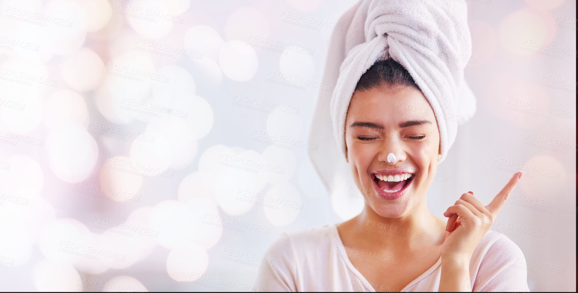 Buy stock photo Woman, face cream and mockup banner, bokeh background and advertising skincare product for wellness. Happy female, towel and facial lotion for aesthetic makeup, beauty or salon smile on mock up space