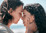 Face, love and summer with a couple together at the beach, sharing an intimate moment outdoor closeup. Trust, travel or relax with a young man and woman enjoying a romantic date bonding in nature