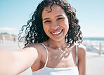 Beach selfie, black woman portrait and social media influencer streaming on app. Travel content creator, young person and sea smile of a happy female in Miami taking a profile picture on vacation