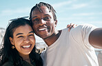 Smile, portrait and selfie of couple at beach outdoors, having fun or enjoying holiday time. Travel face, love diversity and man and woman take photo for social media, profile picture or happy memory